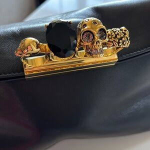 Alexander McQueen lamb Black Leather Bag with Gold Accents four ring clutch